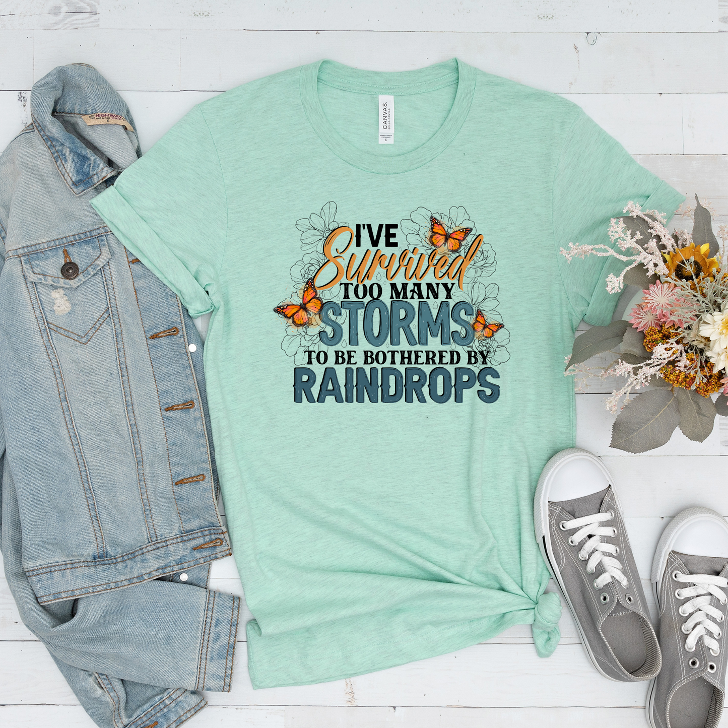I've Survived Too Many Storms to be Bothered by Raindrops Tee