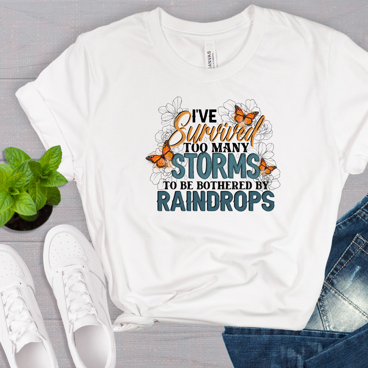 I've Survived Too Many Storms to be Bothered by Raindrops Tee
